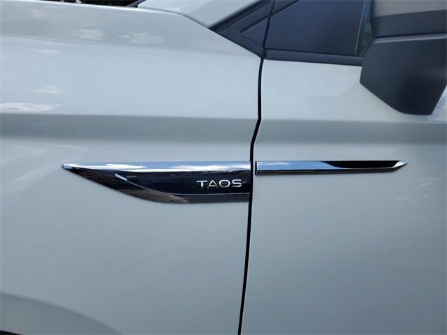 new 2024 Volkswagen Taos car, priced at $22,932