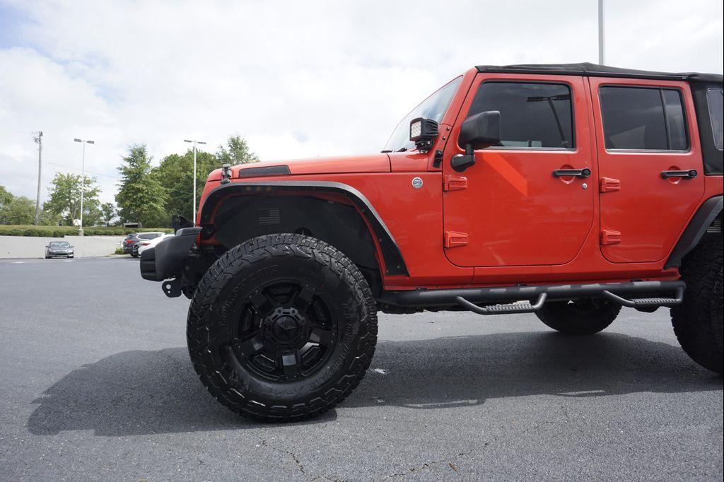 used 2013 Jeep Wrangler Unlimited car, priced at $18,995