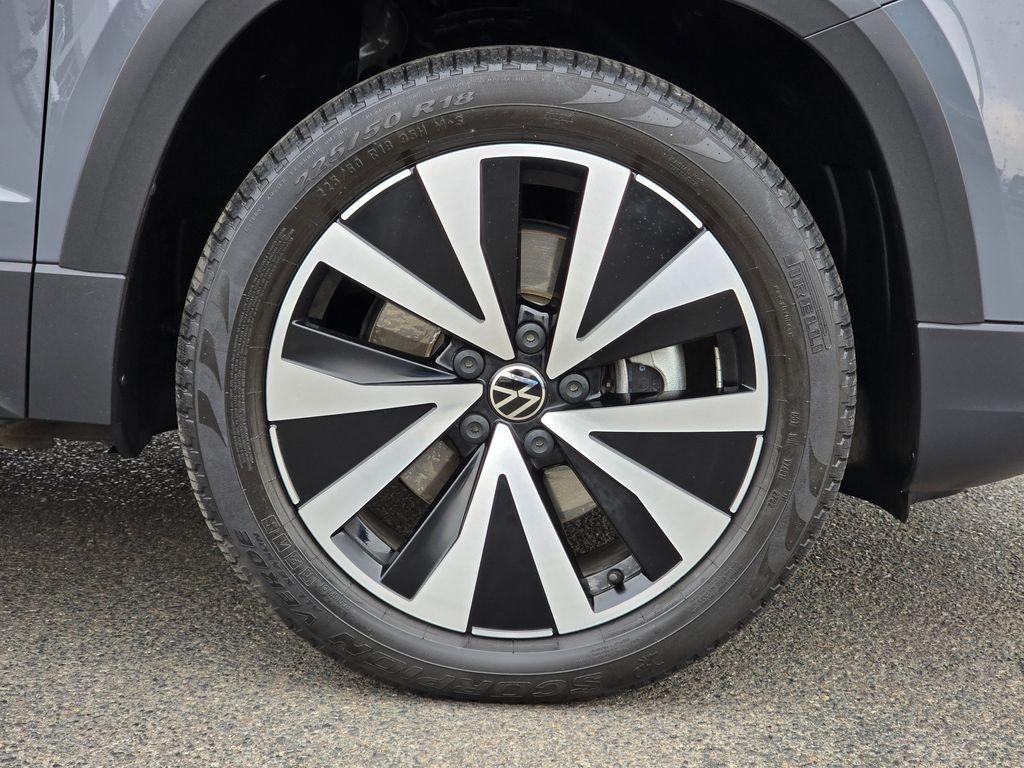 used 2023 Volkswagen Taos car, priced at $23,359