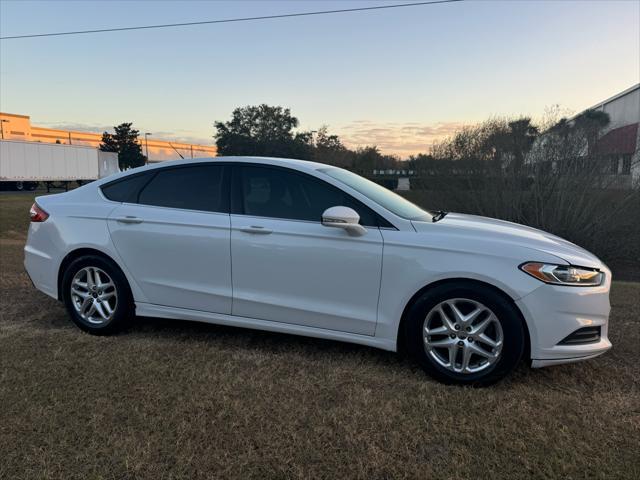 used 2016 Ford Fusion car, priced at $5,995