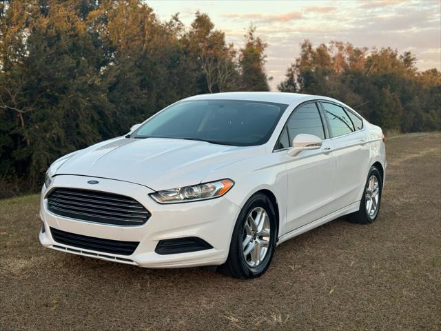 used 2016 Ford Fusion car, priced at $5,995