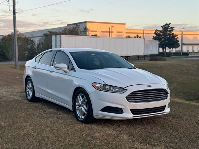 used 2016 Ford Fusion car, priced at $5,995