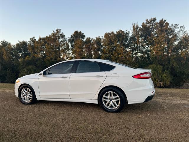 used 2016 Ford Fusion car, priced at $5,995