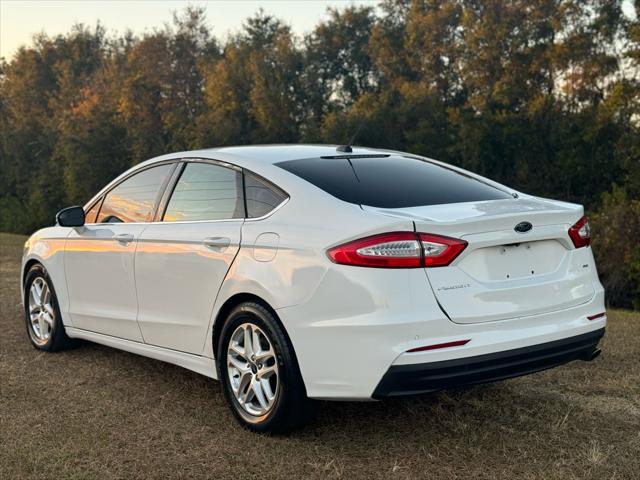 used 2016 Ford Fusion car, priced at $5,995