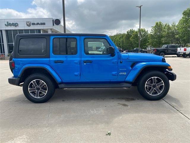 used 2023 Jeep Wrangler car, priced at $28,006
