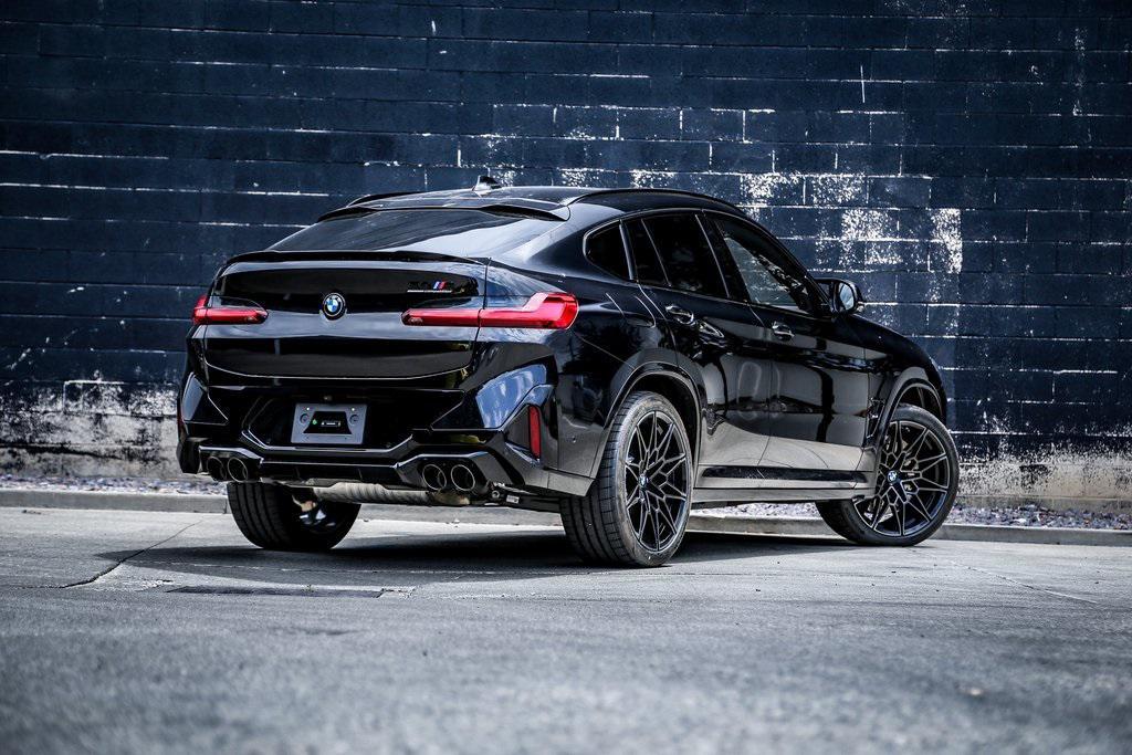 new 2025 BMW X4 M car, priced at $94,640