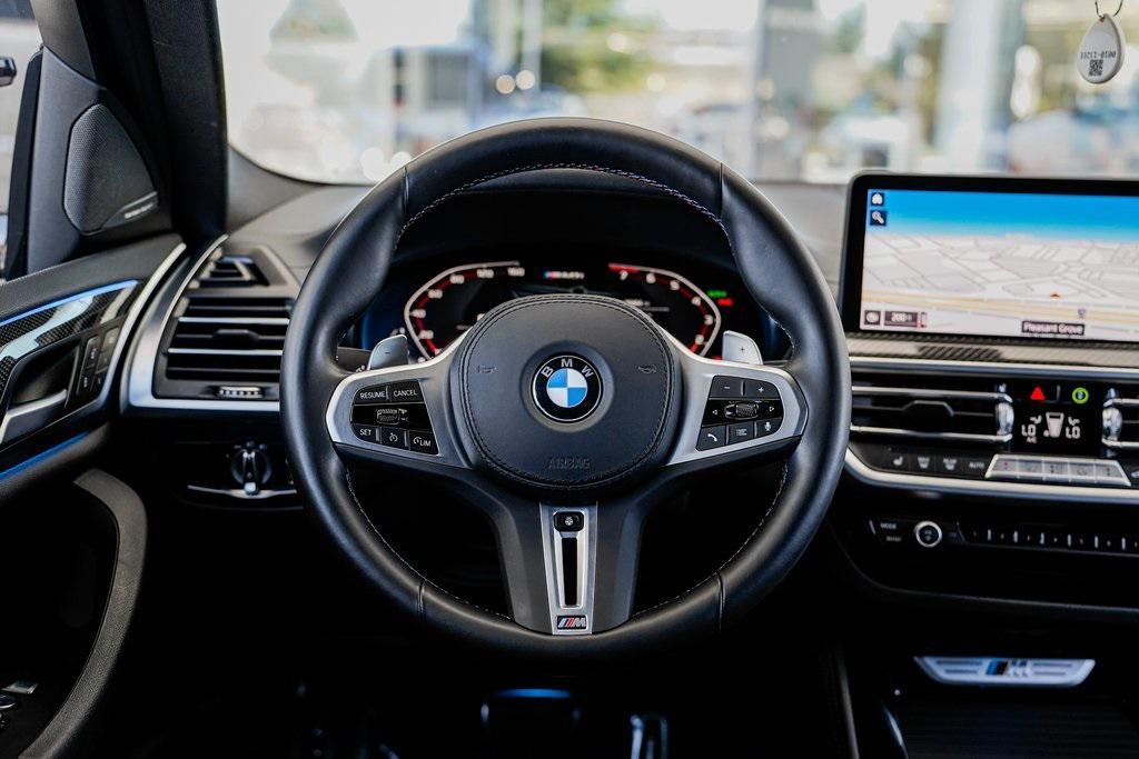 used 2023 BMW X4 car, priced at $55,995