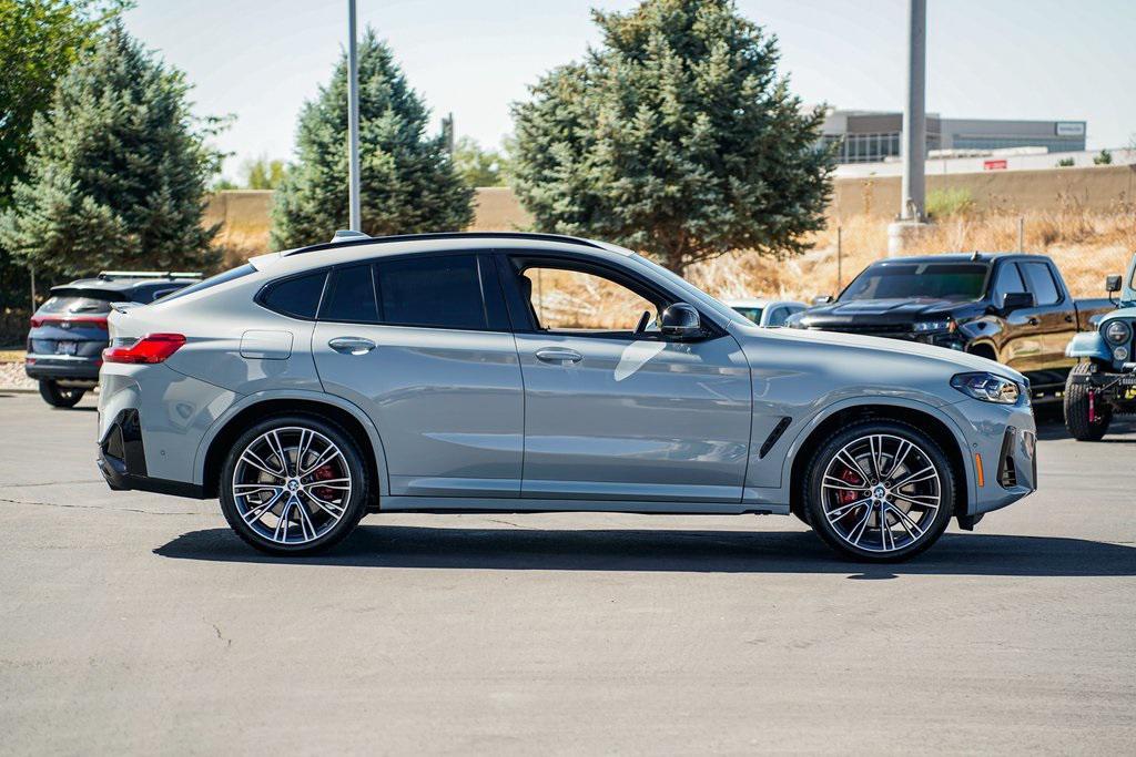 used 2023 BMW X4 car, priced at $55,995