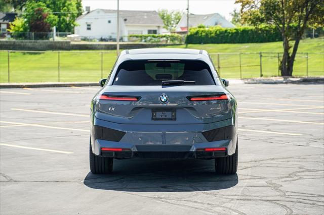 used 2024 BMW iX car, priced at $58,995