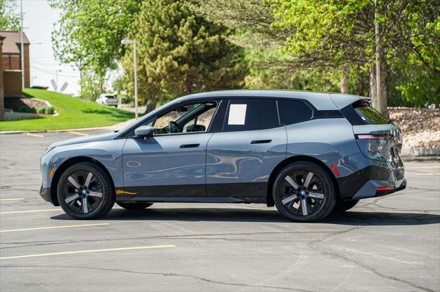 used 2024 BMW iX car, priced at $58,995