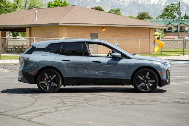 used 2024 BMW iX car, priced at $58,995