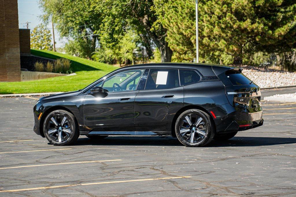 used 2025 BMW iX car, priced at $94,580