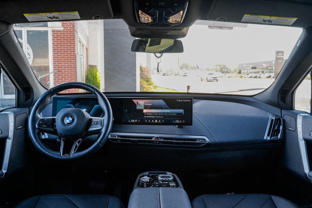 used 2025 BMW iX car, priced at $94,580