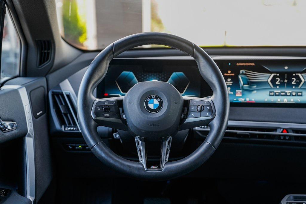 used 2025 BMW iX car, priced at $94,580