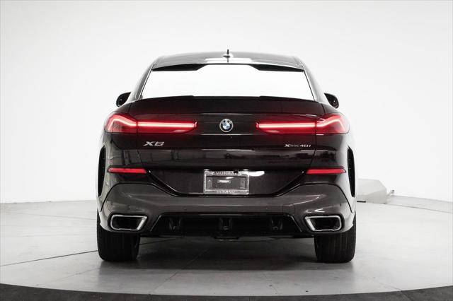 used 2022 BMW X6 car, priced at $58,995