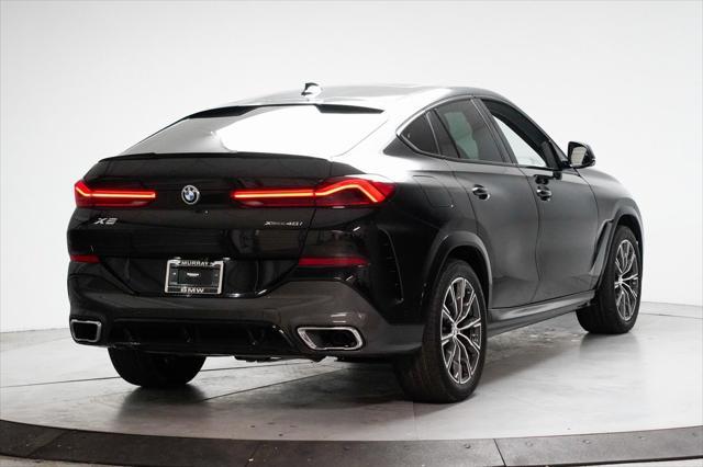 used 2022 BMW X6 car, priced at $58,995