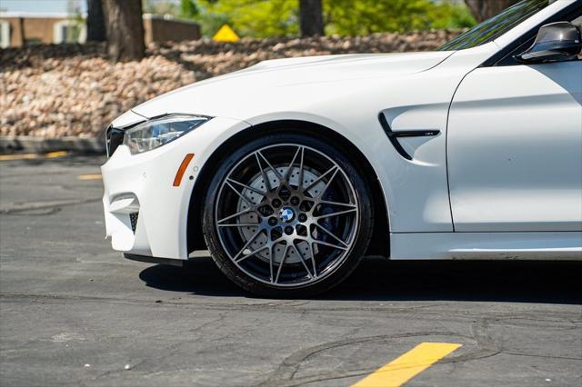 used 2018 BMW M4 car, priced at $53,995