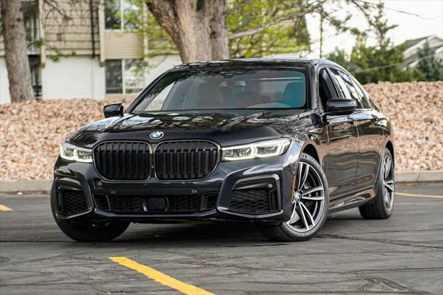 used 2022 BMW 750 car, priced at $54,995