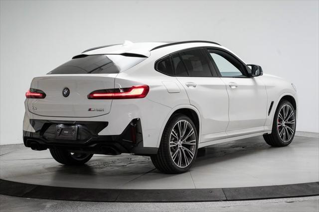 used 2023 BMW X4 car, priced at $54,995