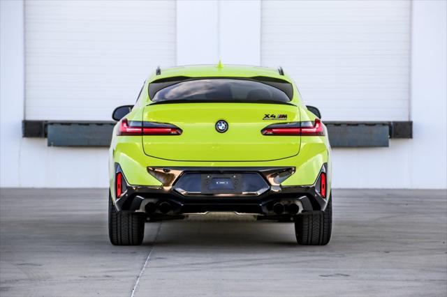 new 2024 BMW X4 M car, priced at $93,115