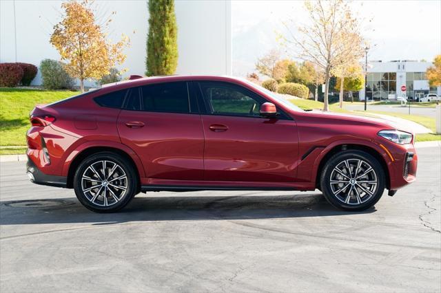 used 2023 BMW X6 car, priced at $63,106