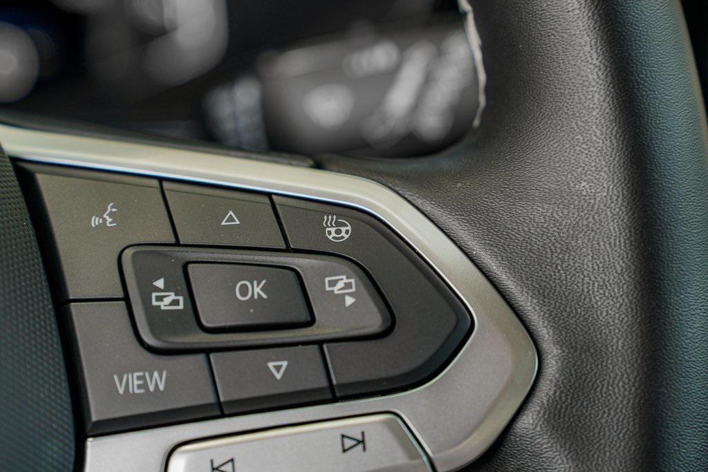 used 2024 Volkswagen Taos car, priced at $28,695