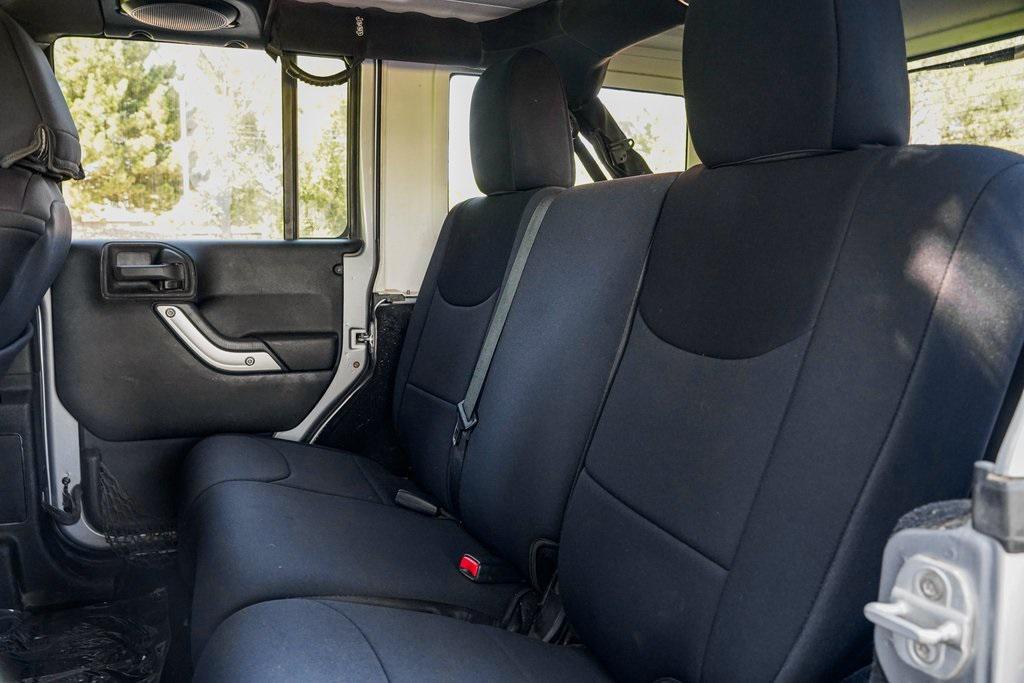 used 2013 Jeep Wrangler Unlimited car, priced at $17,995