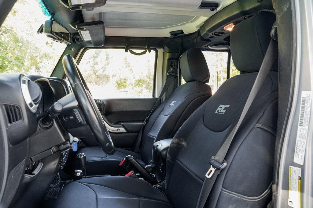 used 2013 Jeep Wrangler Unlimited car, priced at $17,995