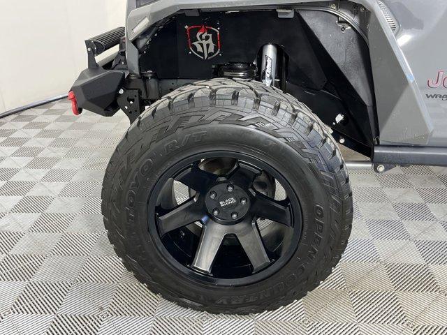 used 2021 Jeep Wrangler Unlimited car, priced at $38,245