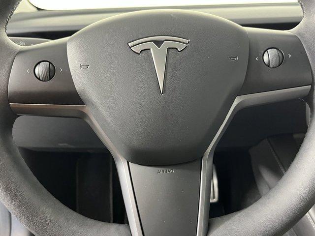 used 2023 Tesla Model 3 car, priced at $35,691