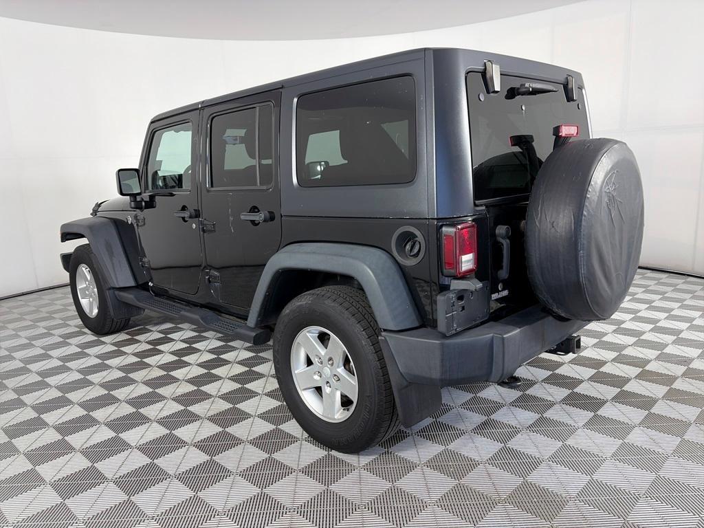 used 2013 Jeep Wrangler Unlimited car, priced at $17,991