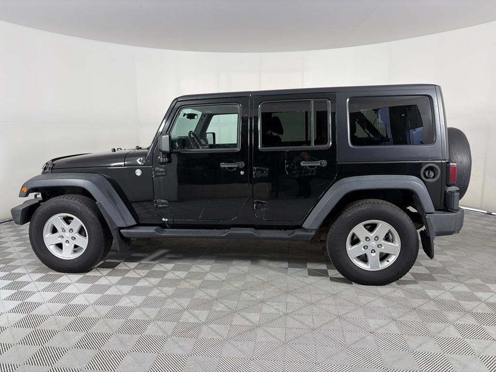 used 2013 Jeep Wrangler Unlimited car, priced at $17,991