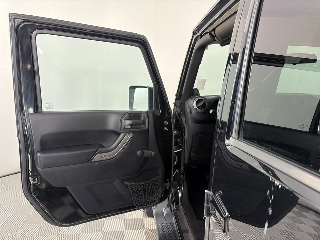 used 2013 Jeep Wrangler Unlimited car, priced at $17,991