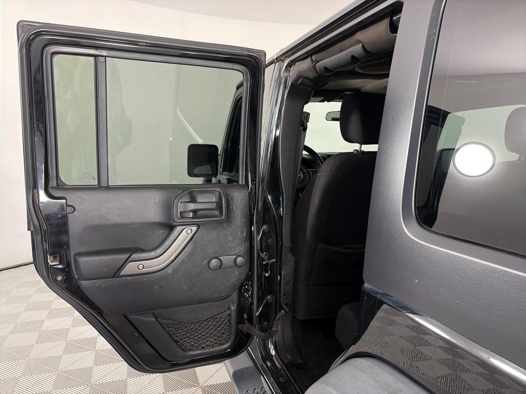 used 2013 Jeep Wrangler Unlimited car, priced at $17,991