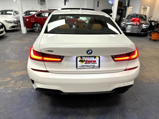 used 2021 BMW 330 car, priced at $27,658