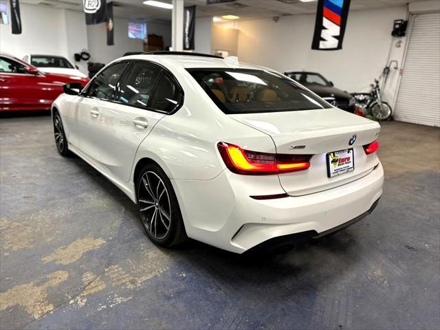 used 2021 BMW 330 car, priced at $27,658