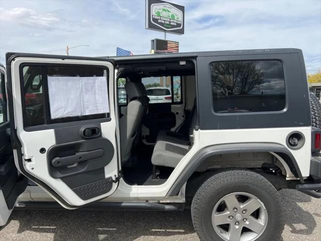 used 2010 Jeep Wrangler Unlimited car, priced at $14,995