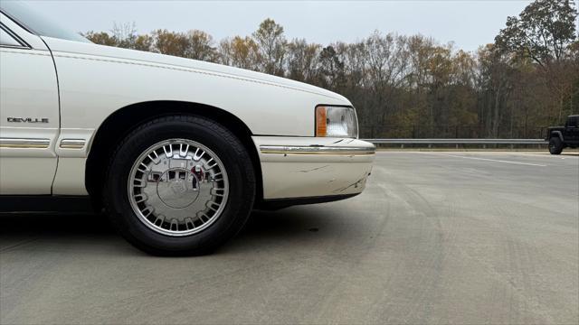 used 1999 Cadillac DeVille car, priced at $12,000