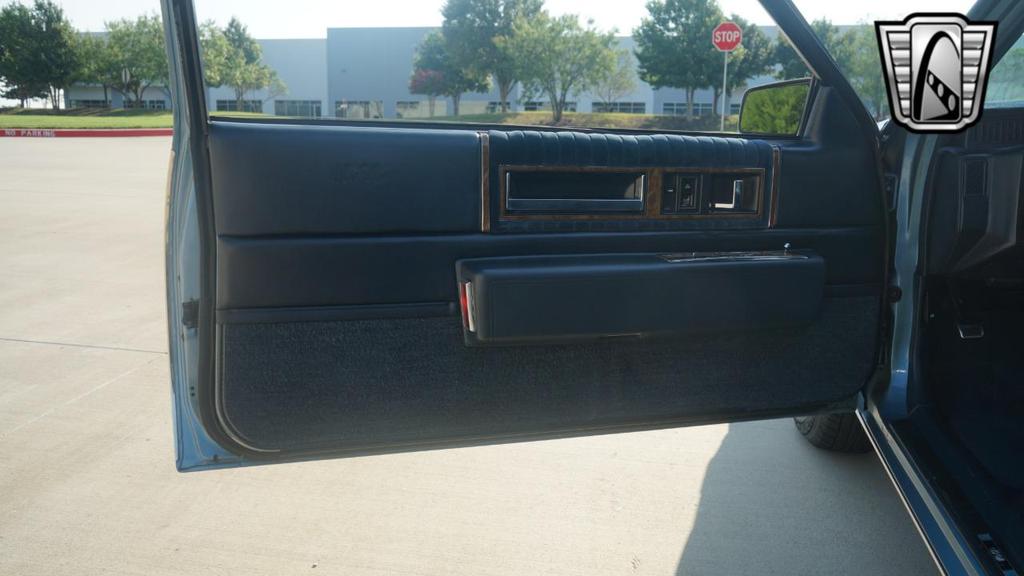 used 1985 Cadillac DeVille car, priced at $10,000