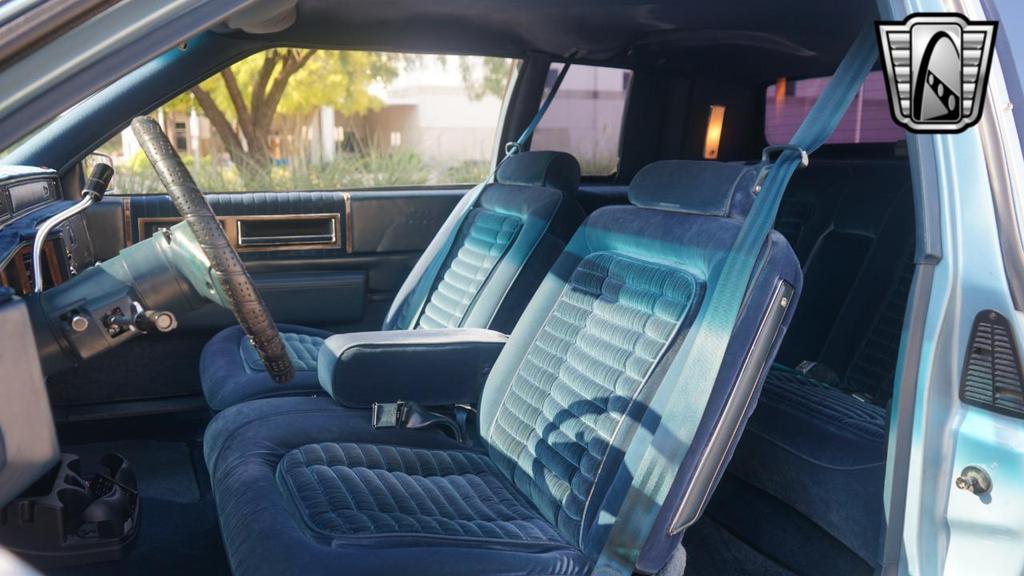 used 1985 Cadillac DeVille car, priced at $10,000