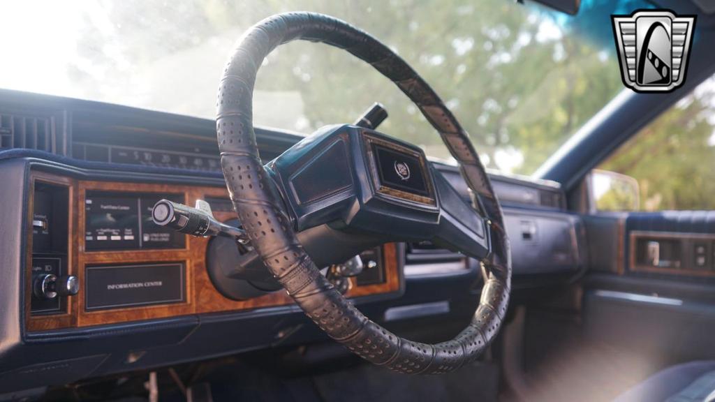 used 1985 Cadillac DeVille car, priced at $10,000