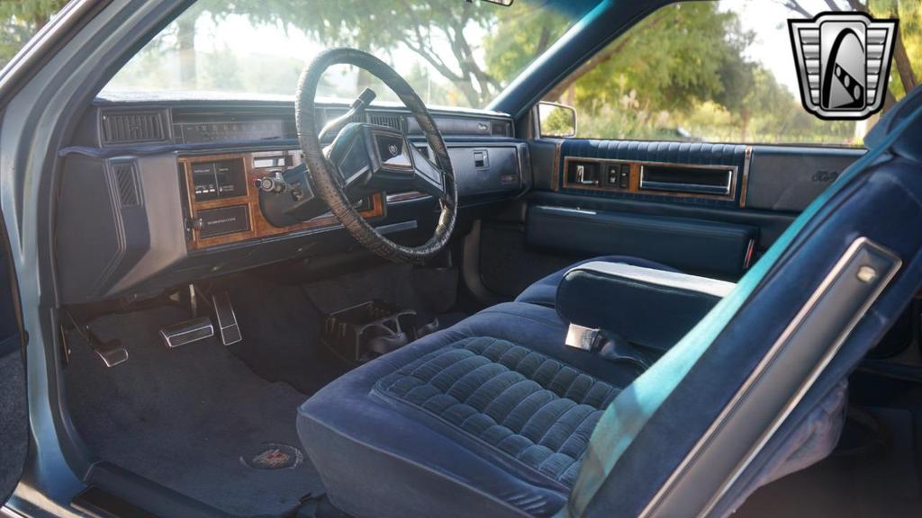 used 1985 Cadillac DeVille car, priced at $10,000
