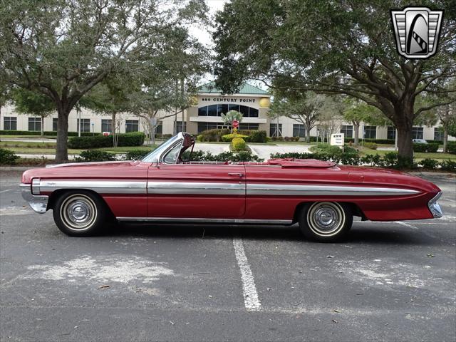 used 1961 Oldsmobile Starfire car, priced at $35,000