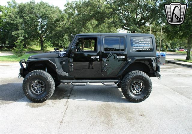 used 2015 Jeep Wrangler Unlimited car, priced at $42,000