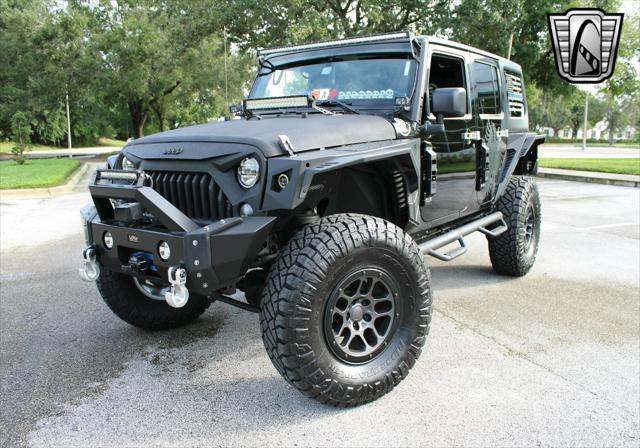 used 2015 Jeep Wrangler Unlimited car, priced at $42,000