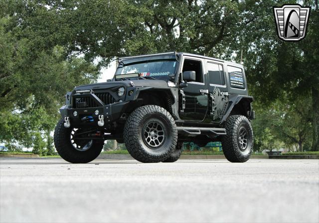 used 2015 Jeep Wrangler Unlimited car, priced at $42,000