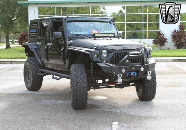 used 2015 Jeep Wrangler Unlimited car, priced at $42,000