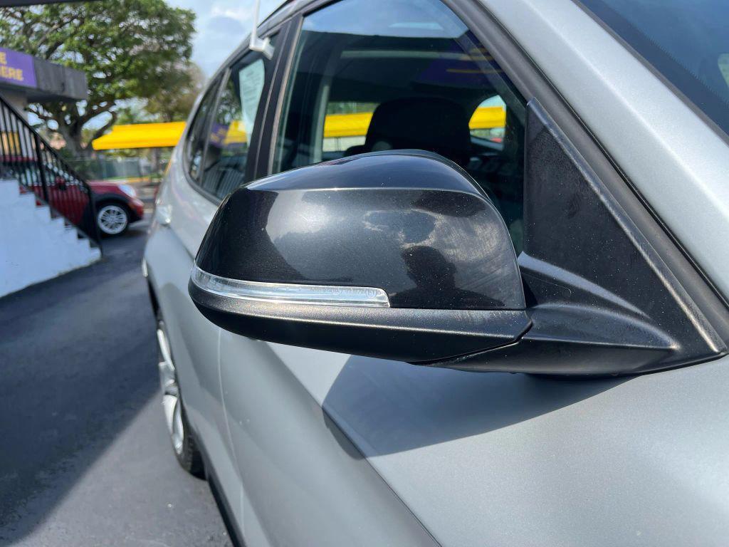 used 2013 BMW X1 car, priced at $9,999