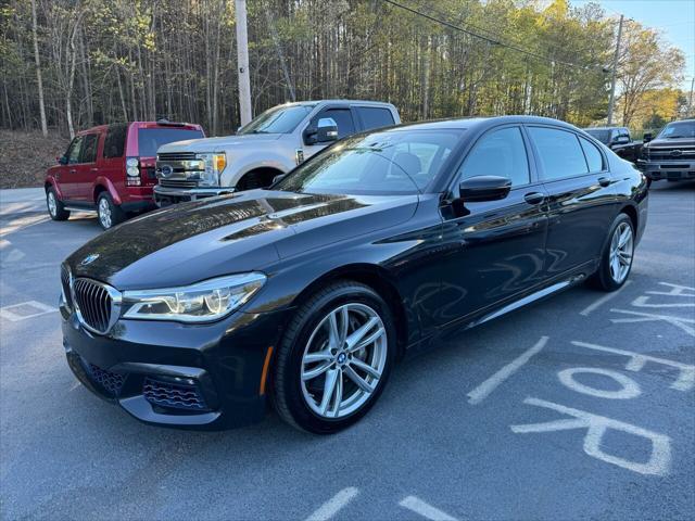 used 2016 BMW 750 car, priced at $18,999