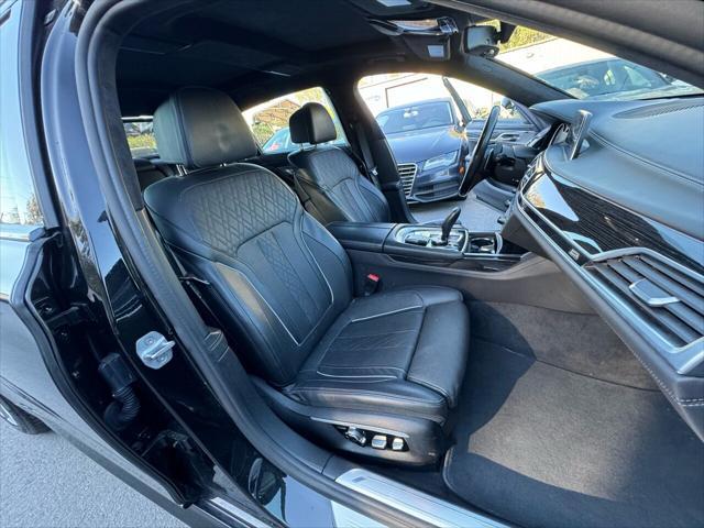 used 2016 BMW 750 car, priced at $18,999